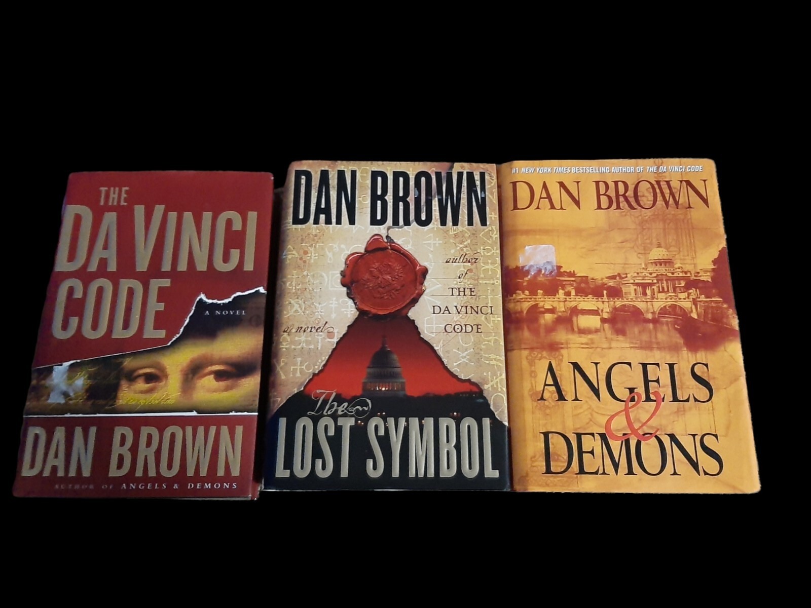 Dan Brown X3 Novels: The Davinci Code/ Lost Symbol/Angel + Demons Pre-Owned