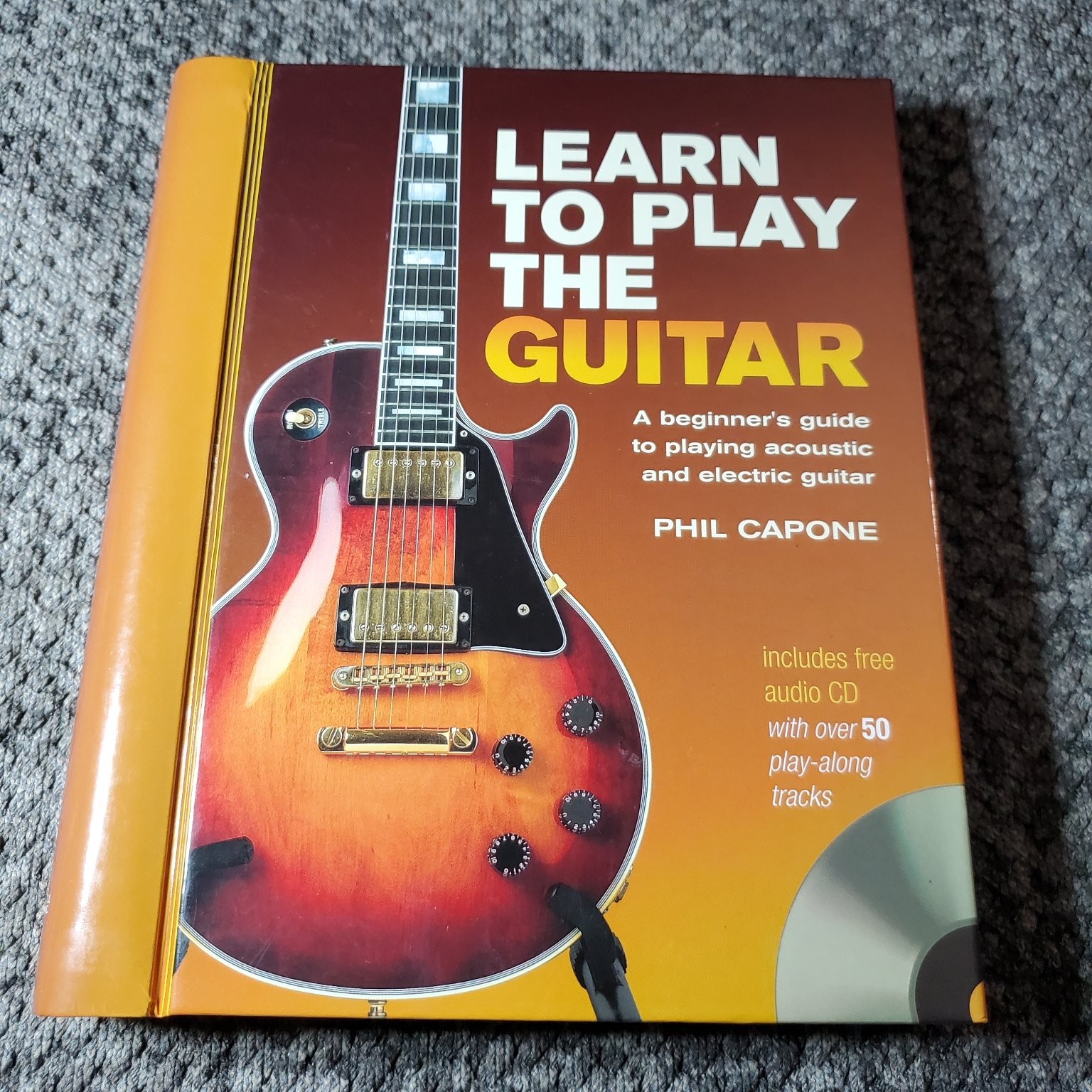 Learn to Play the Guitar Phil Capone 2007 Beginner Guide Chartwell